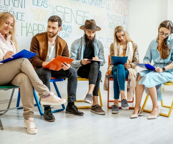 Group of people during the psychological therapy indoors