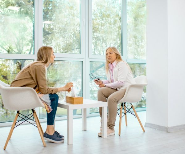 Woman with psychologist in the office